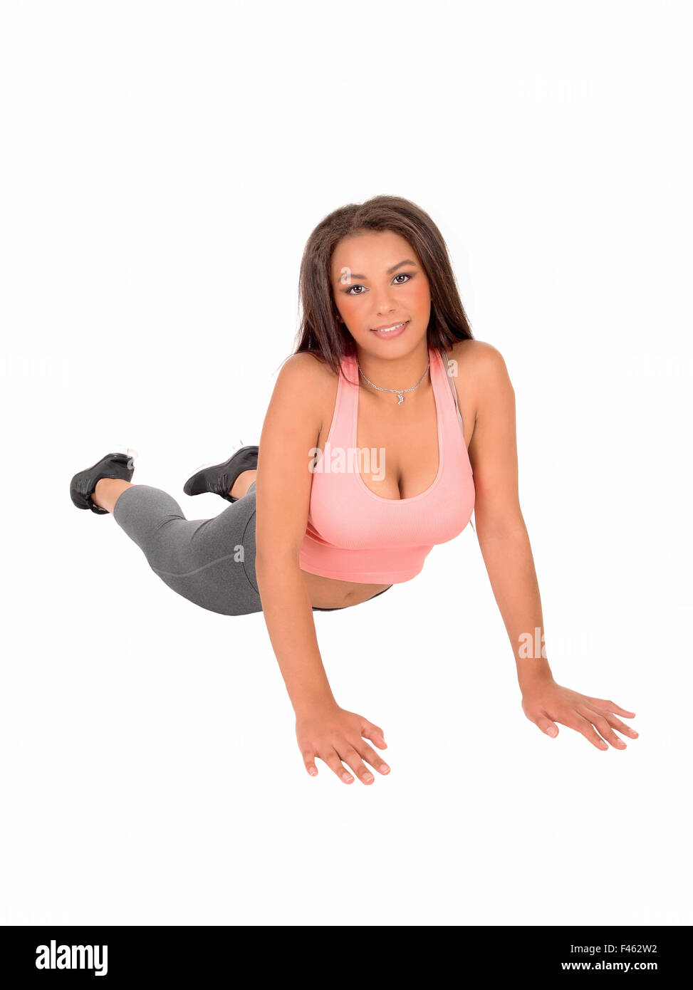 Woman doing pushups. Banque D'Images
