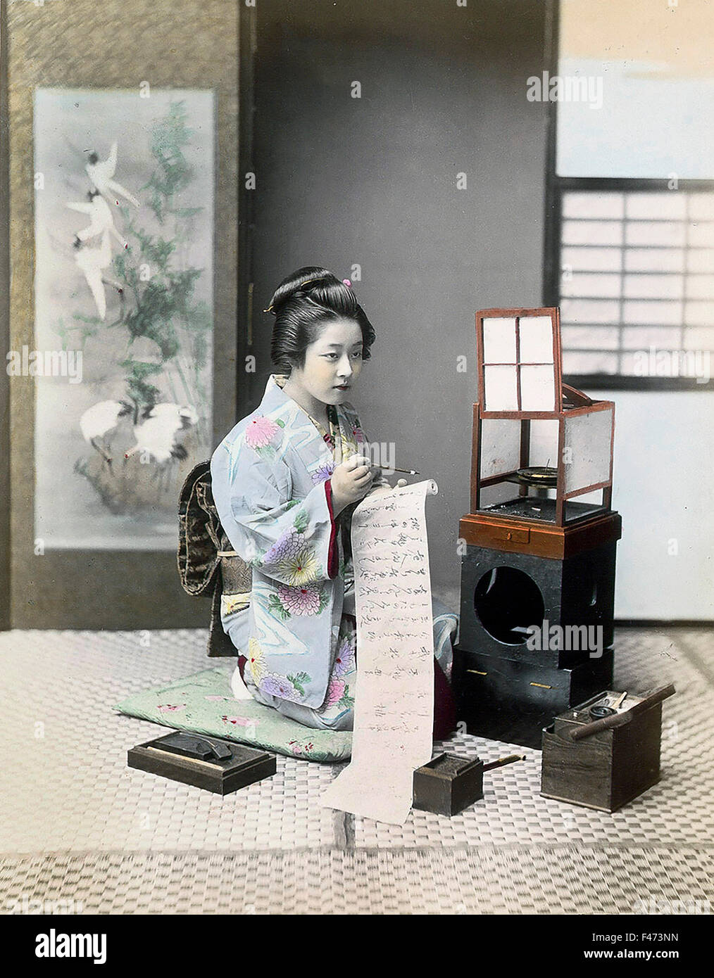 Geisha écrit lettre, Japon Banque D'Images