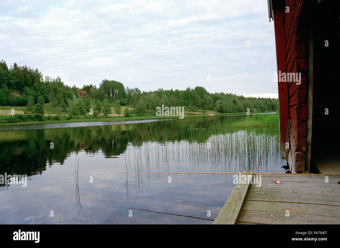 Canne à pêche à la jetée, en Suède. Banque D'Images