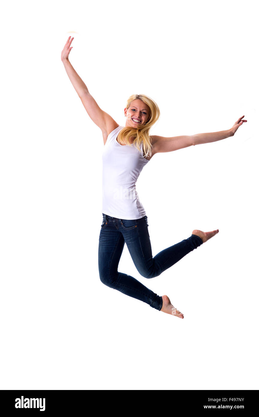 Attractive Woman jumping Banque D'Images