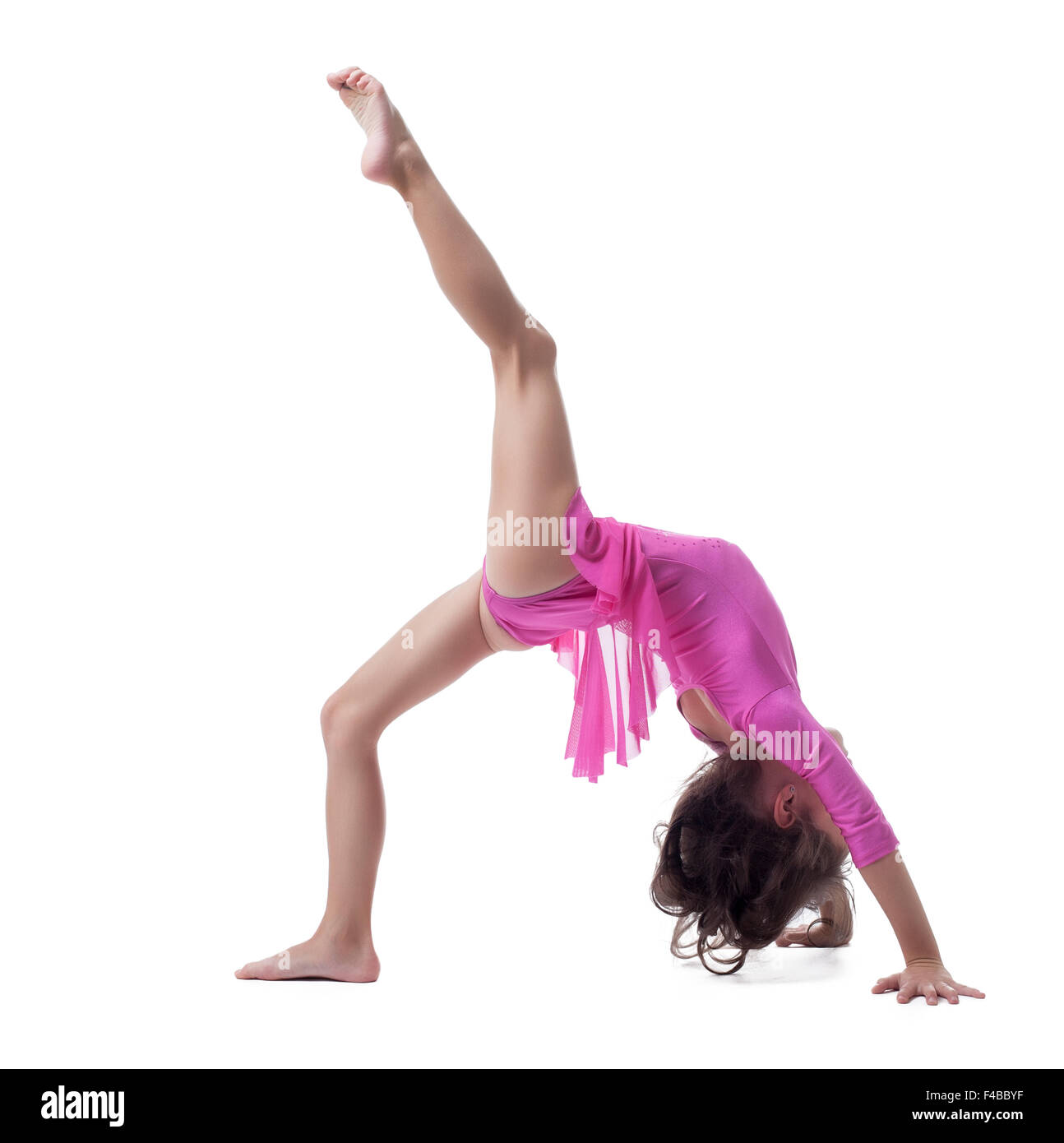 Peu flexible girl doing gymnastic bridge Banque D'Images