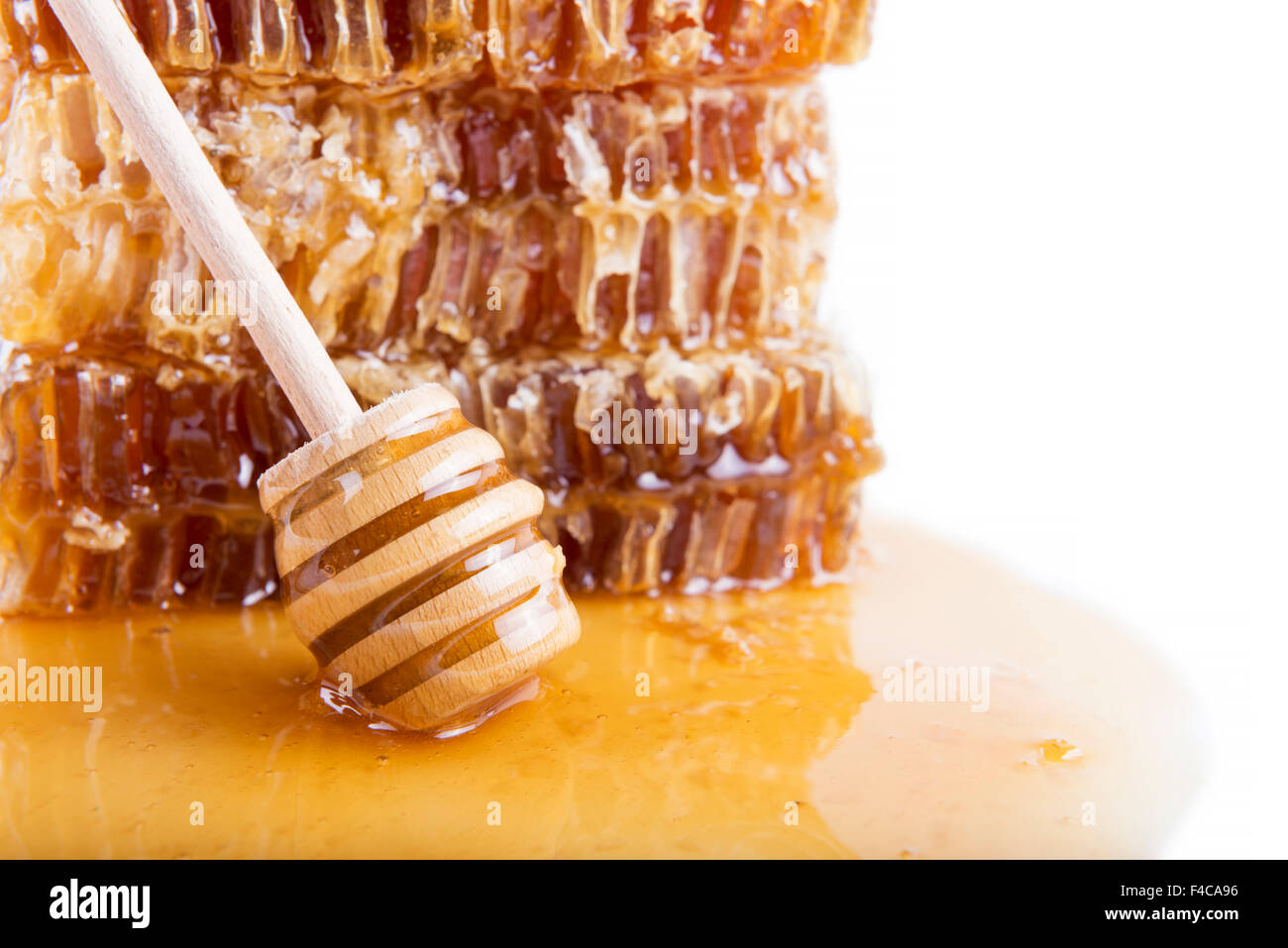 Avec du miel d'abeilles et de miel stick Banque D'Images