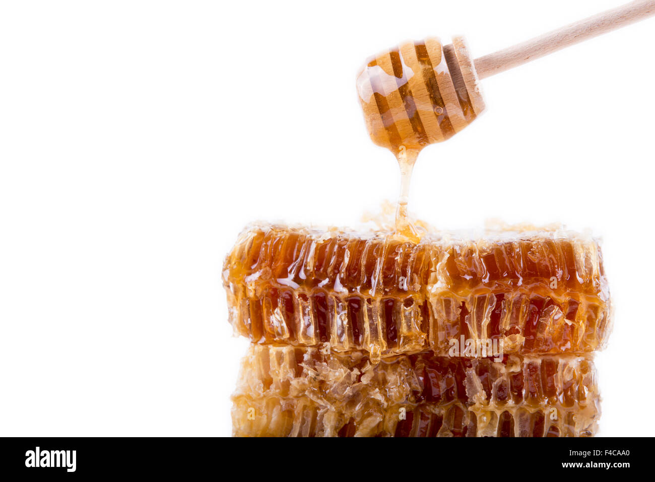 Avec du miel d'abeilles et de miel stick Banque D'Images