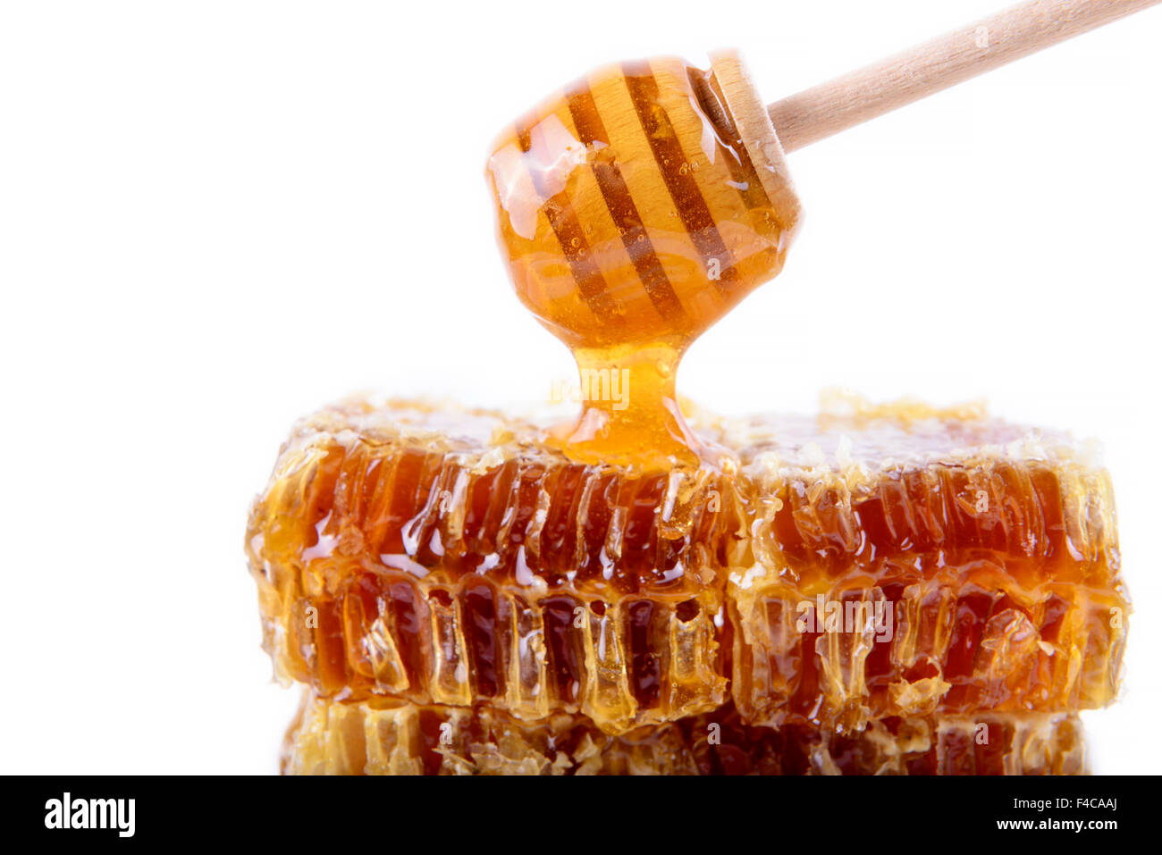 Avec du miel d'abeilles et de miel stick Banque D'Images