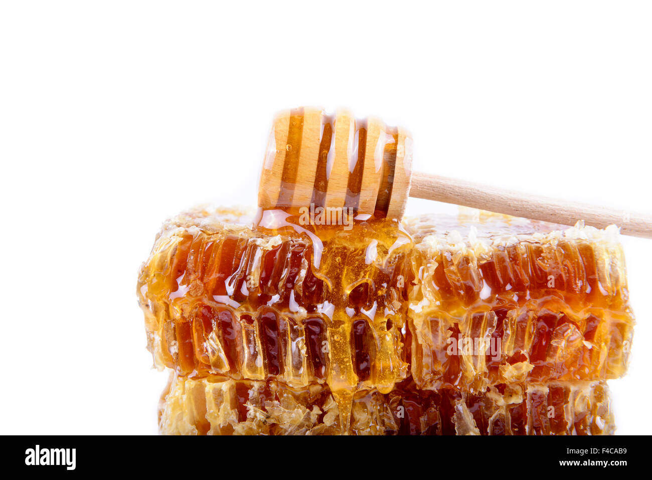 Avec du miel d'abeilles et de miel stick Banque D'Images