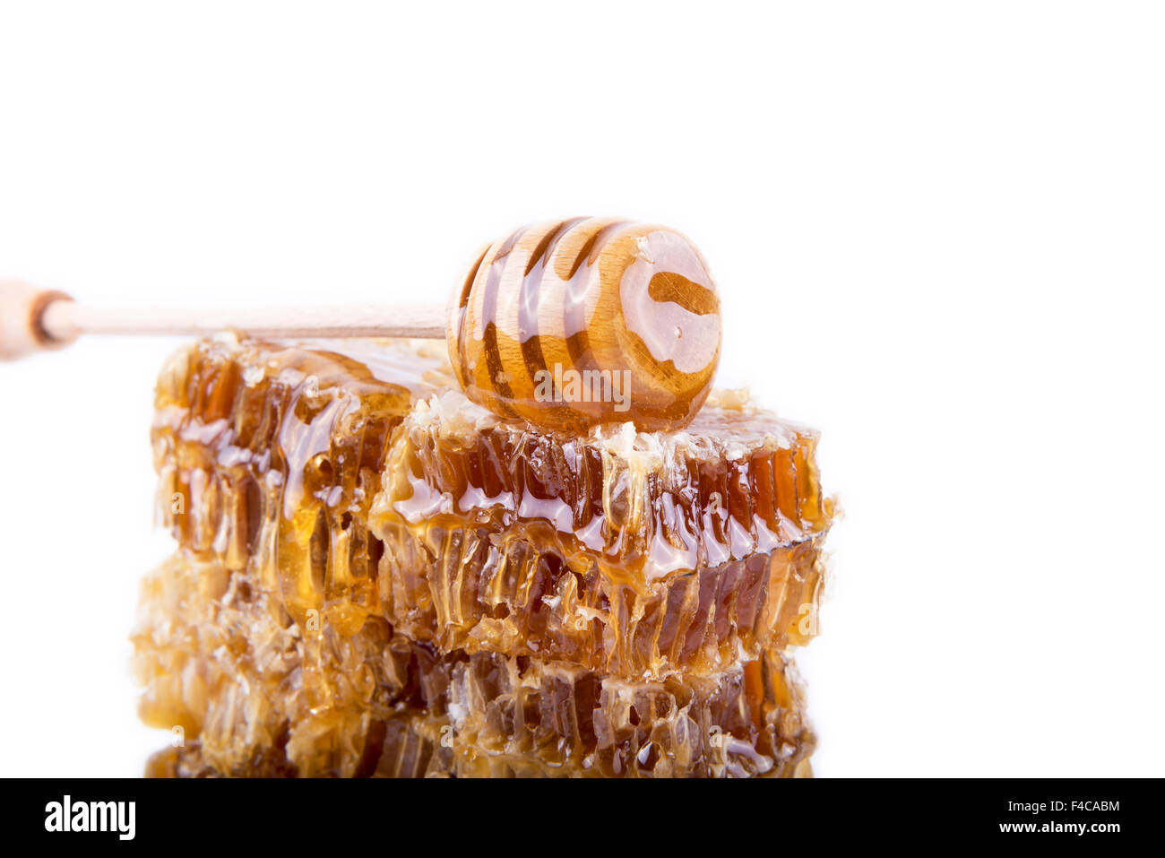 Avec du miel d'abeilles et de miel stick Banque D'Images