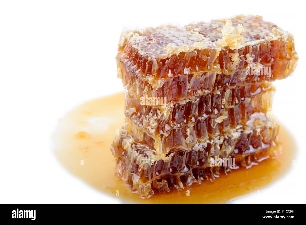 De miel avec du miel sur fond blanc Banque D'Images