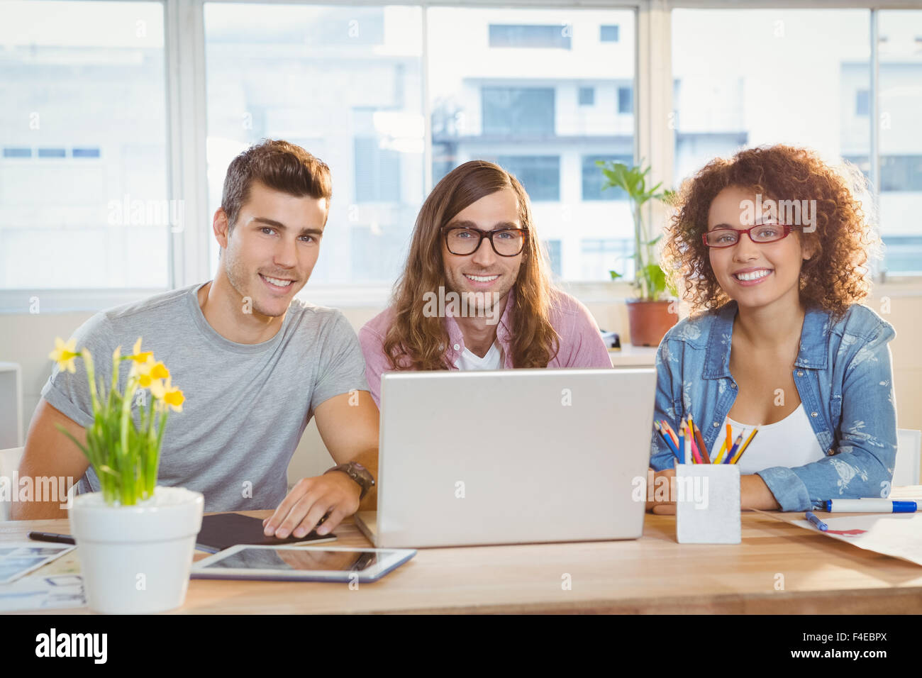 Portrait of smiling business people sitting by 24 Banque D'Images