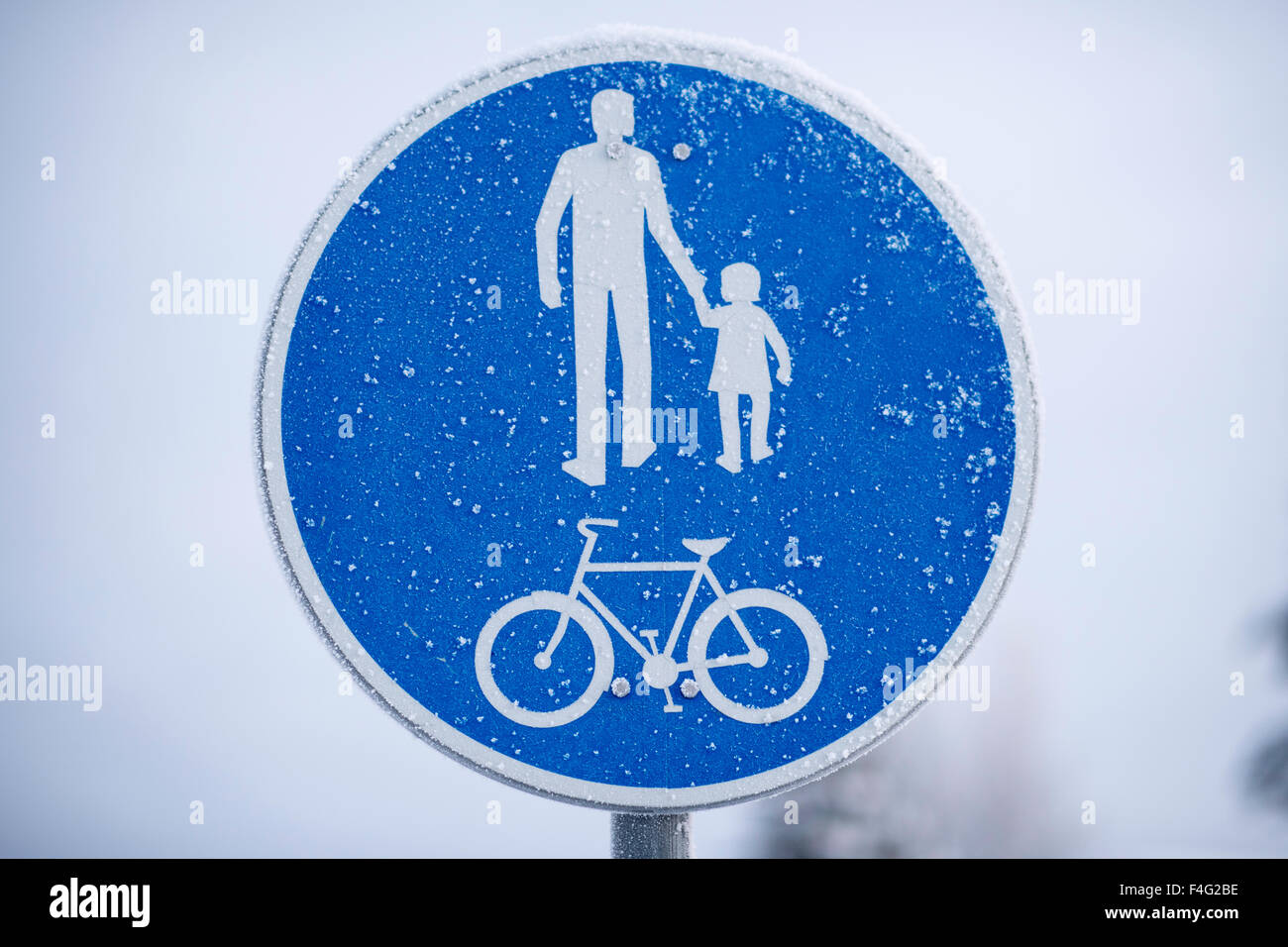 Panneau bleu avec adulte et enfant Banque de photographies et d’images ...