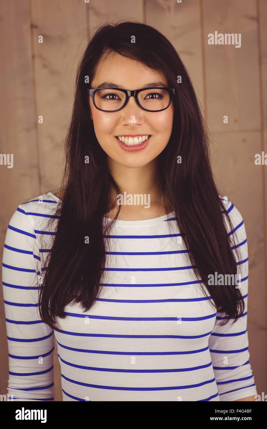 Smiling attractive woman posing for camera Banque D'Images