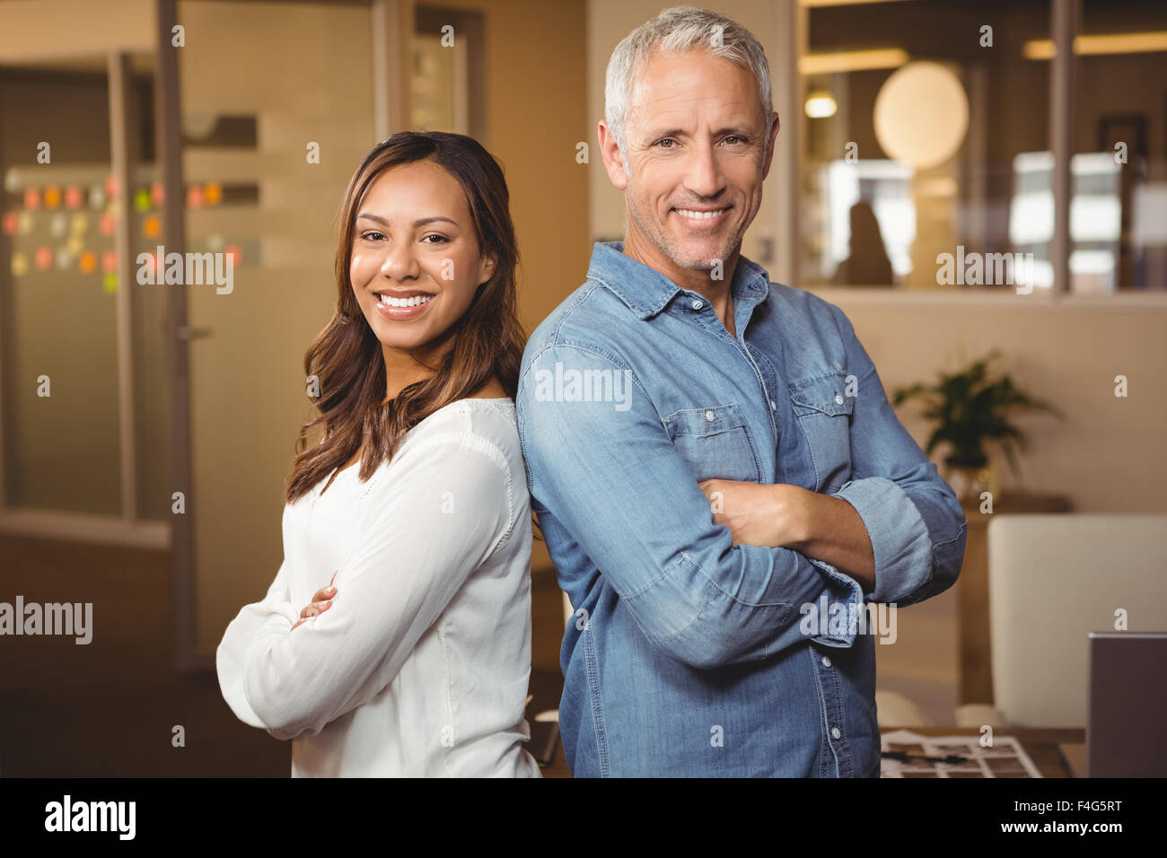 Portrait of business people standing in office Banque D'Images