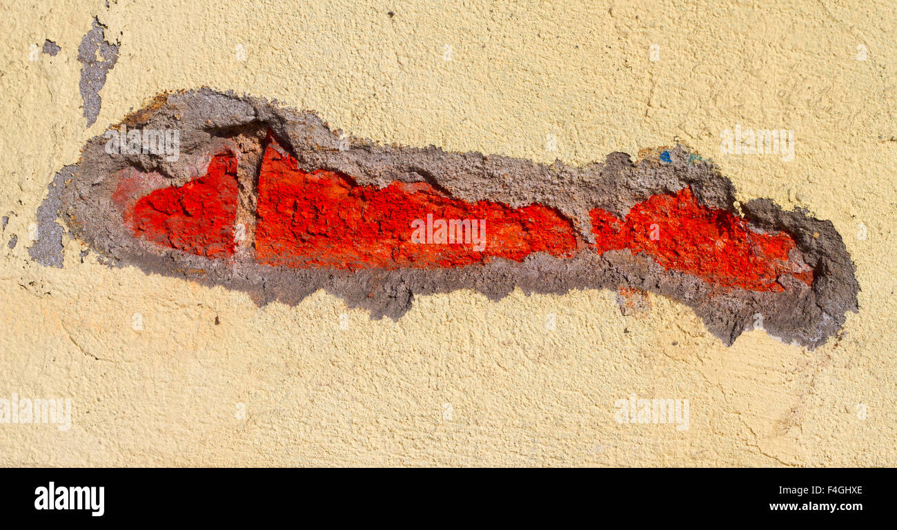 Dommage sur un mur de brique close up Banque D'Images