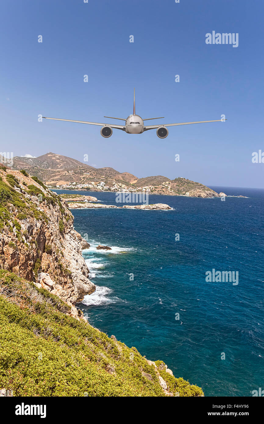 Avion de passagers et près de front à l'île et sur la magnifique mer bleue en destination de vacances d'été, aller à l Banque D'Images