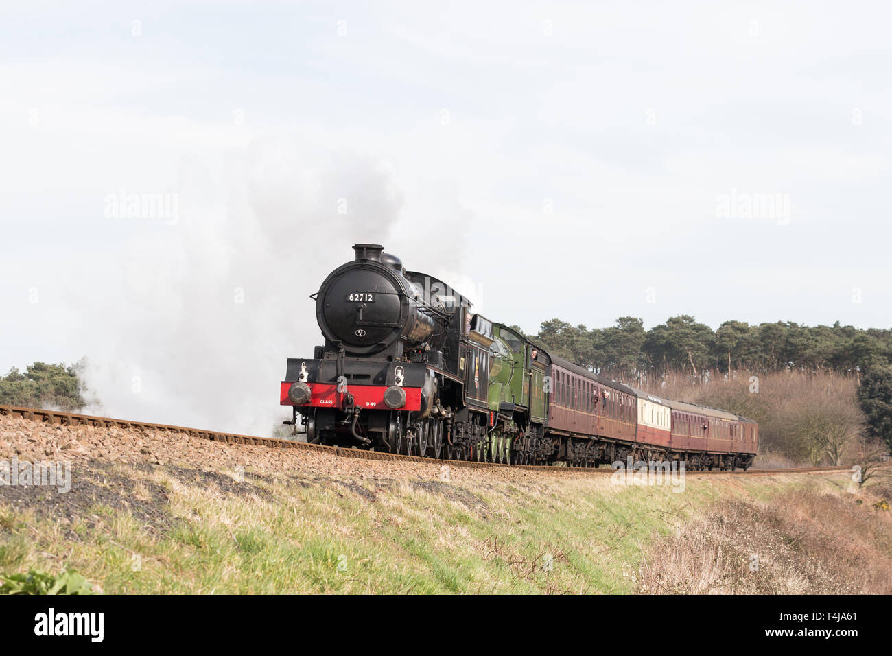 Un train à vapeur sur le chemin de fer près de North Norfolk Sheringham Banque D'Images