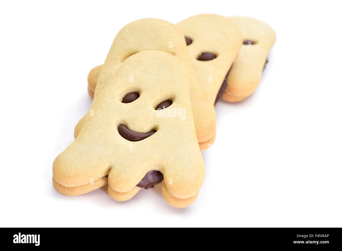 Certains cookies en forme de Ghost sur un fond blanc Banque D'Images