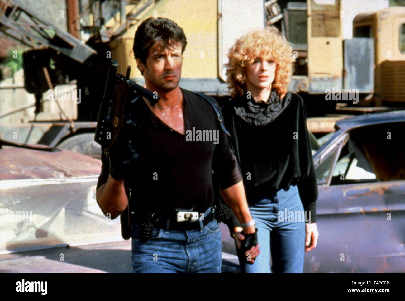 Sylvester Stallone et Brigitte Nielsen / Cobra / 1986 réalisé par George P. Cosmatos Banque D'Images