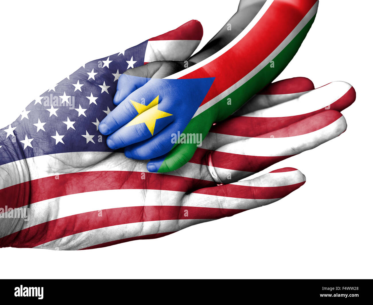Pavillon de l'United States recouvrit la main d'un adulte homme tenant un bébé part avec le drapeau du Soudan du Sud surimprimés. Conceptual Banque D'Images