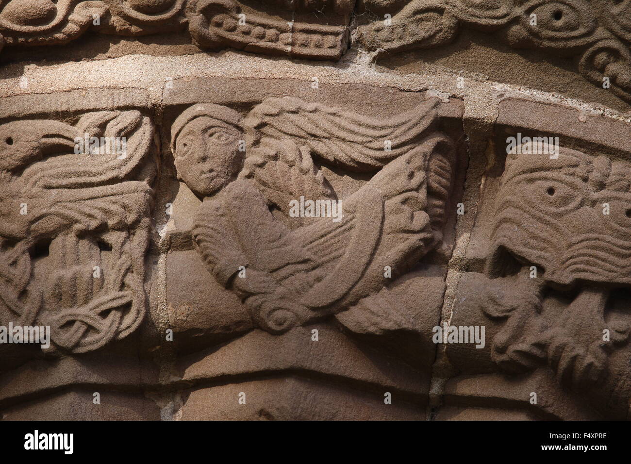 Kilpeck, Église porte sud angel sculpture, Herefordshire, Angleterre Banque D'Images