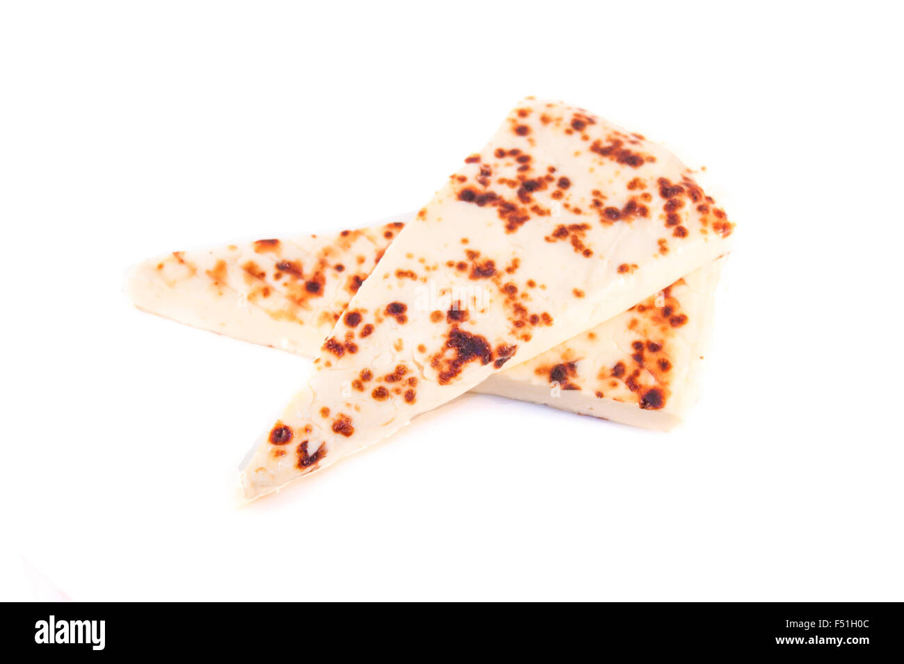 Squeaky finlandais fromage, isolé sur fond blanc Banque D'Images