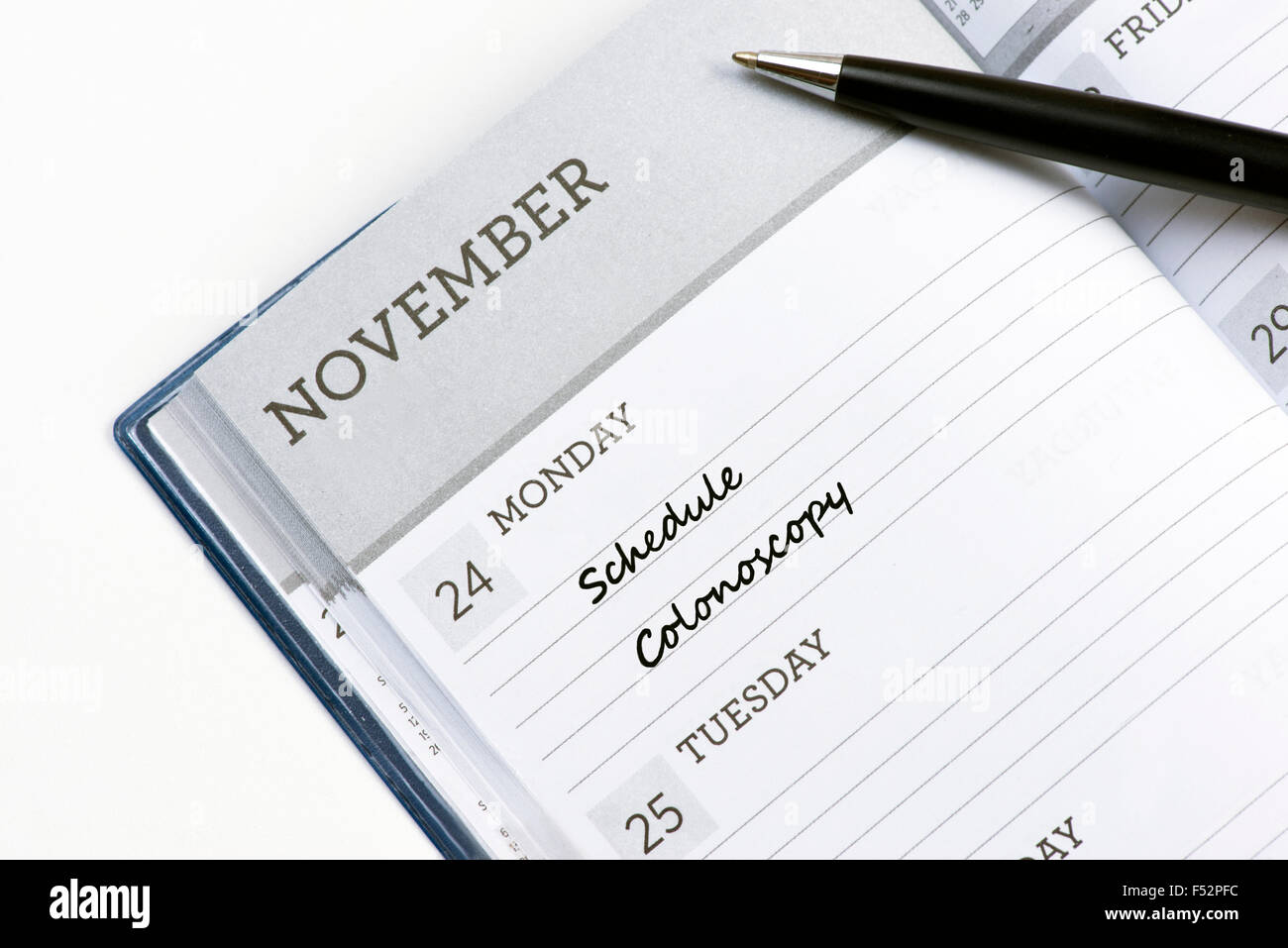 Carnet de rendez-vous à l'annexe rappel de la coloscopie. Banque D'Images