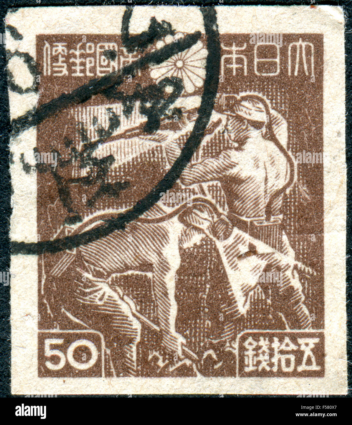 Japon - circa 1946 : timbre-poste imprimé au Japon, montre les mineurs de charbon, vers 1946 Banque D'Images