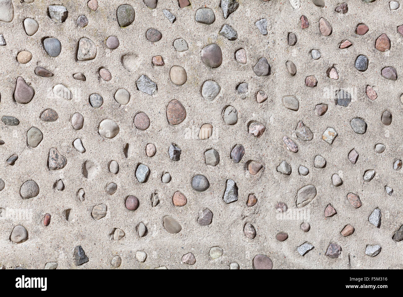 En pierres du mur de ciment naturel, résumé fond ou la texture. Banque D'Images