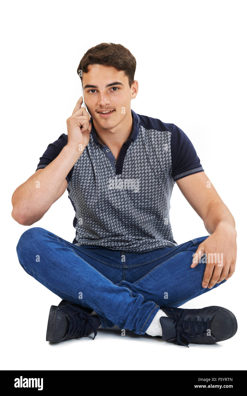 Studio Portrait of Teenage Girl Talking On Mobile Phone Banque D'Images