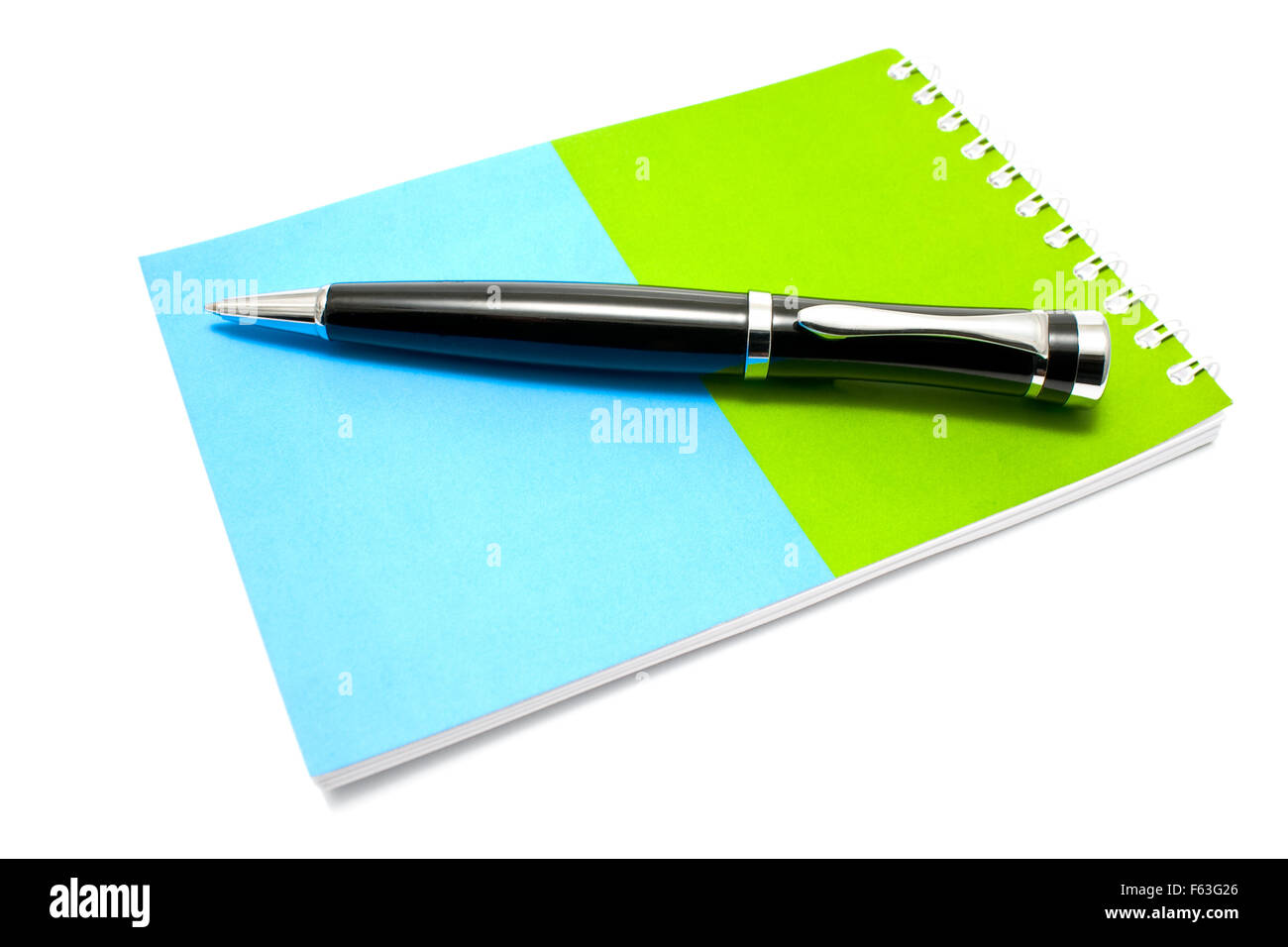 Le bloc-notes et stylo isolated on white Banque D'Images