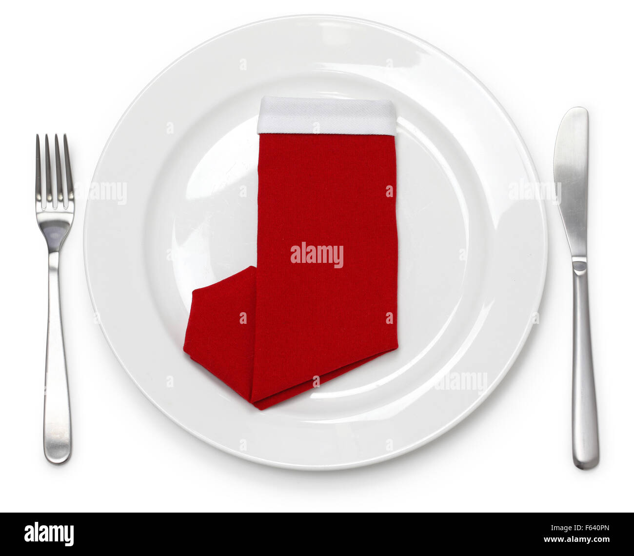Le dîner de Noël, table, serviette pliée comme un père noël boots Banque D'Images