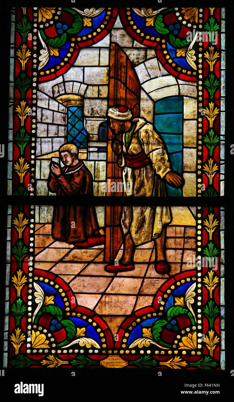 Vitrail représentant un priant Saint Catholique retenus captifs par des Maures, dans la cathédrale de Leon Banque D'Images