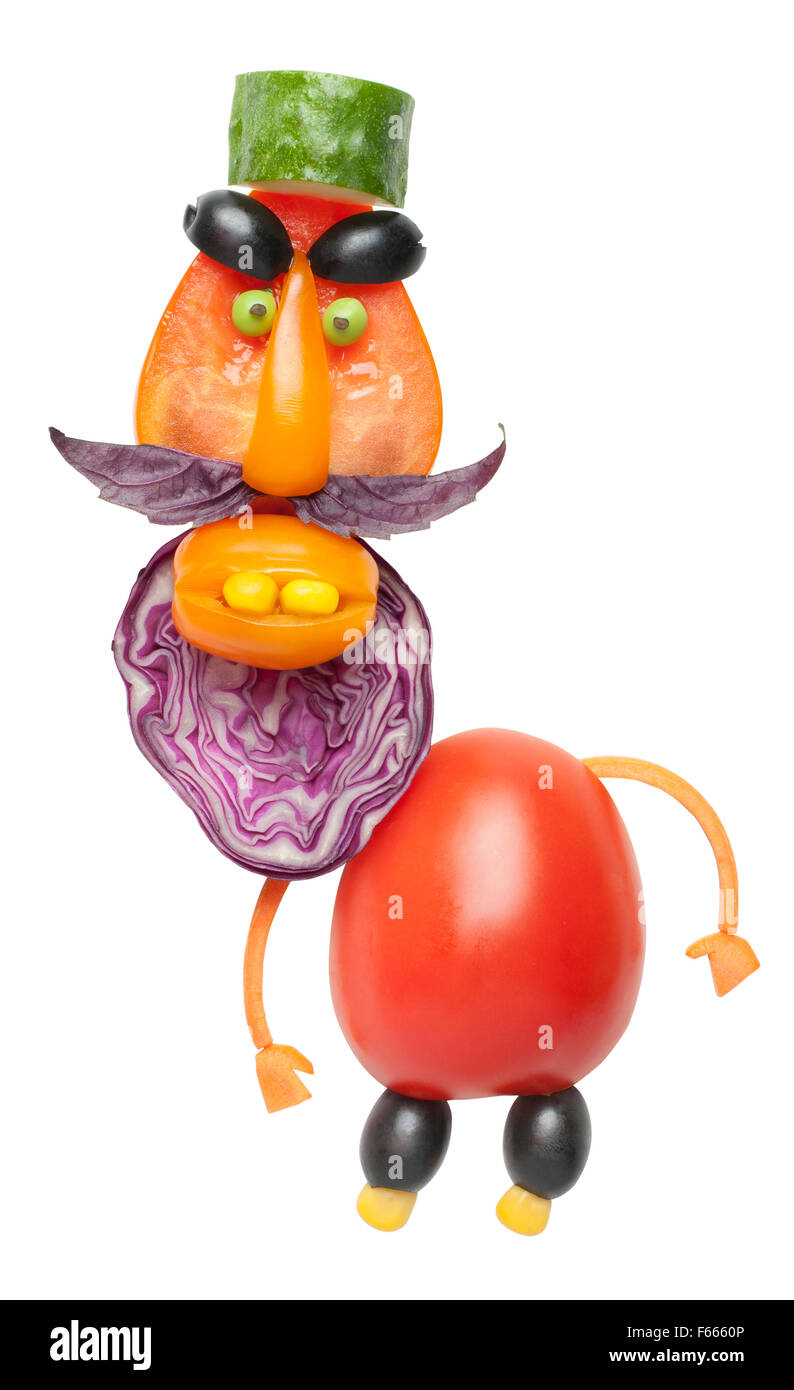 L'homme légumes drôles de tomates et de choux Banque D'Images