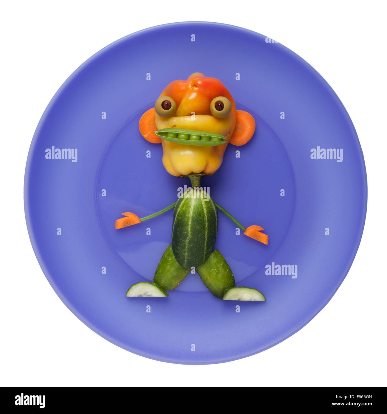 Funny monster légumes sur plaque bleue Banque D'Images
