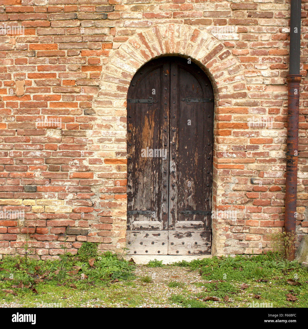 Porte d'un bâtiment ancien, en Toscane, Italie Banque D'Images