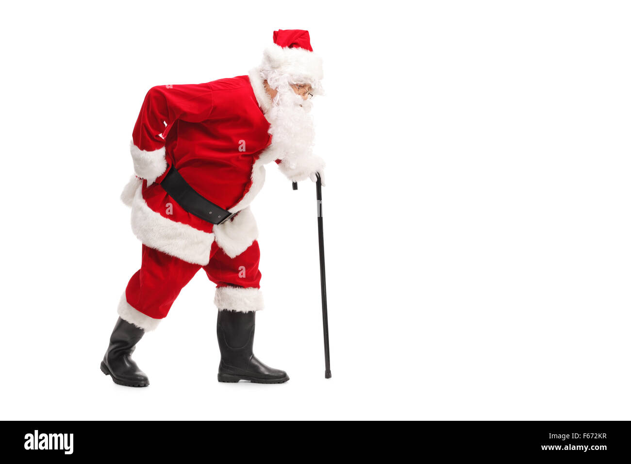 Le Père Noël de marcher avec une canne et qui éprouvent des douleurs au dos  isolé sur fond blanc Photo Stock - Alamy