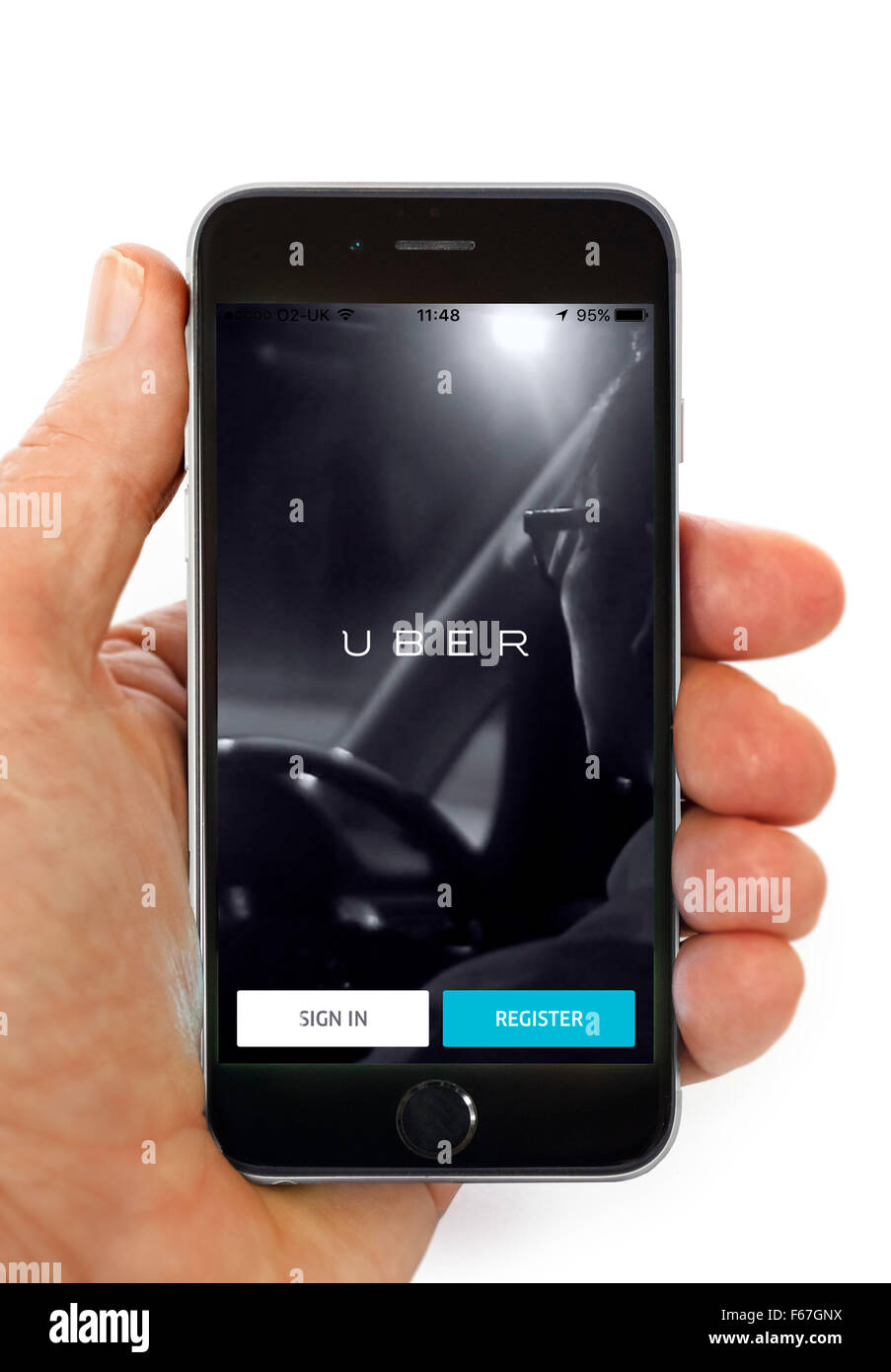 En utilisant l'application Uber sur un iPhone d'Apple 6 Banque D'Images