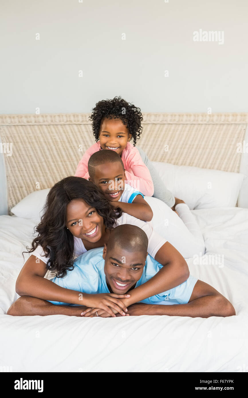 Family having fun together in bed Banque D'Images