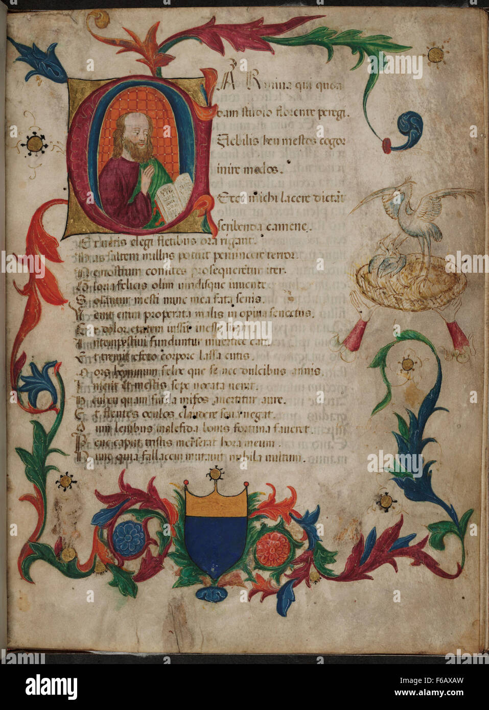 Ce manuscrit présente la première page du Livre I, décorée d'une initiale historiée. La conception comprend des illustrations complexes, typiques des manuscrits médiévaux et de la Renaissance, reflétant l'artisanat et l'importance culturelle de l'époque. Banque D'Images