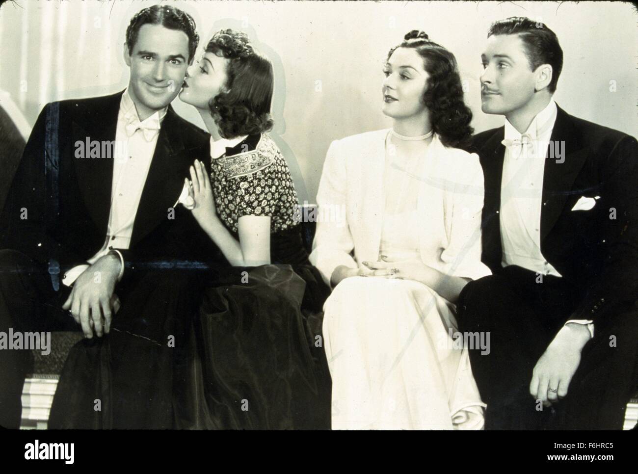 1938, le titre du film : QUATRE'S A Crowd, Réalisateur : Michael Curtiz, Studio : WARNER, Photo : Michael Curtiz, Olivia de Havilland, Errol Flynn, PATRIC KNOWLES. (Crédit Image : SNAP) Banque D'Images