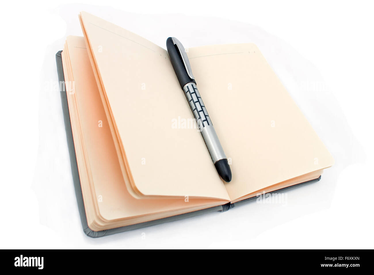 Le bloc-notes et stylo isolated on white Banque D'Images