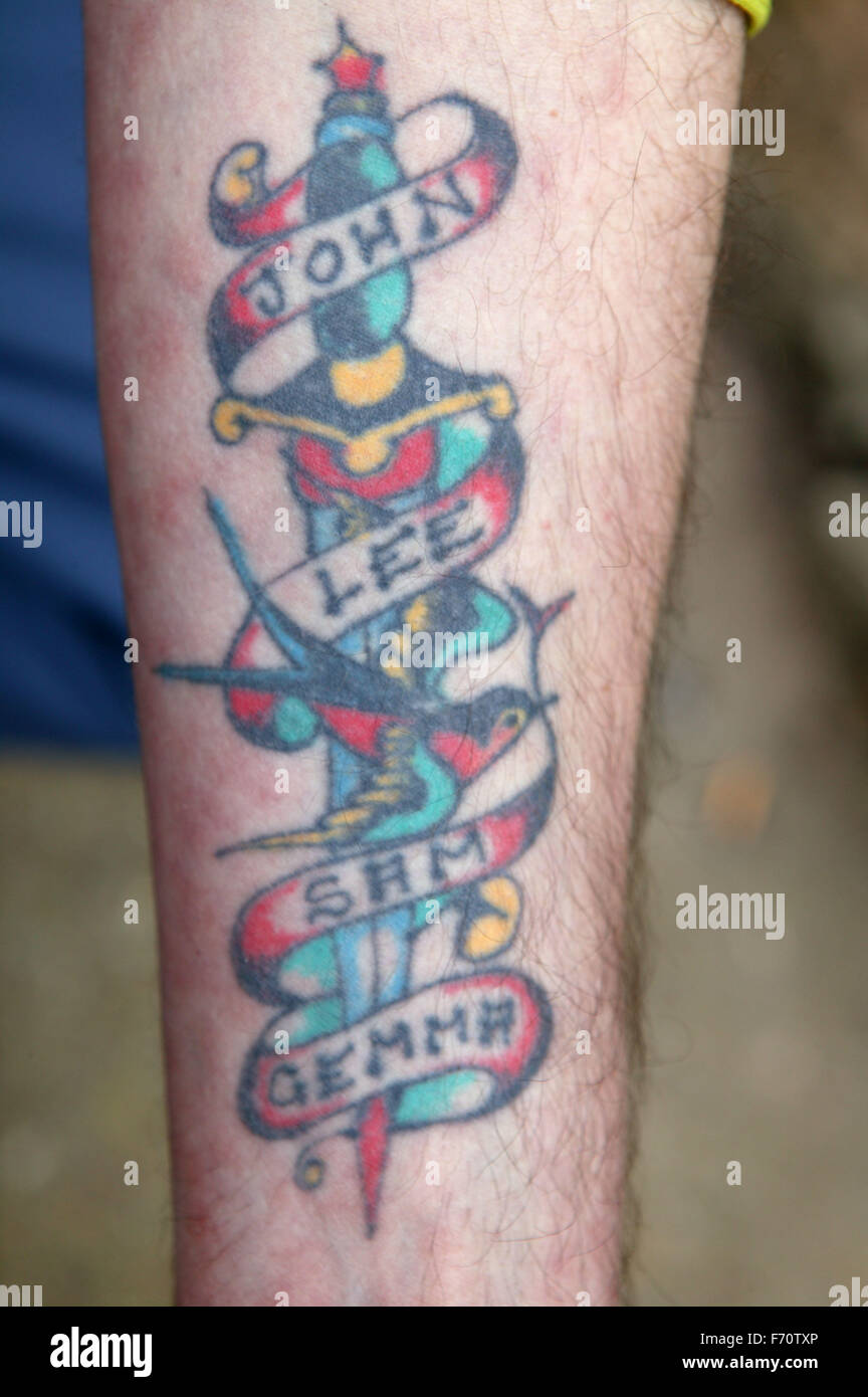 Un tatouage sur le bras, les sans-abri Banque D'Images