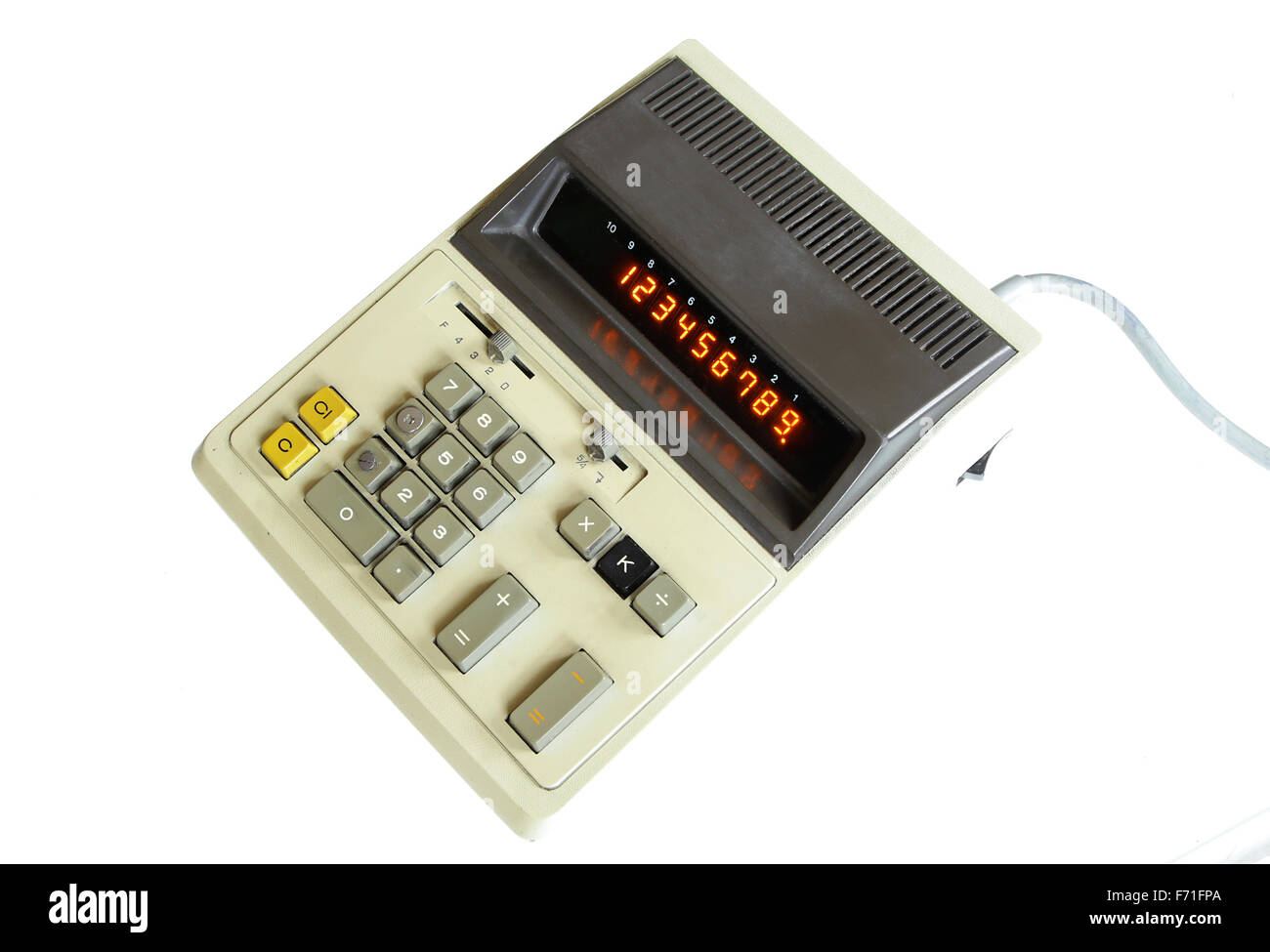 Très vieille calculatrice vintage avec lampe afficher isolé sur fond blanc Banque D'Images