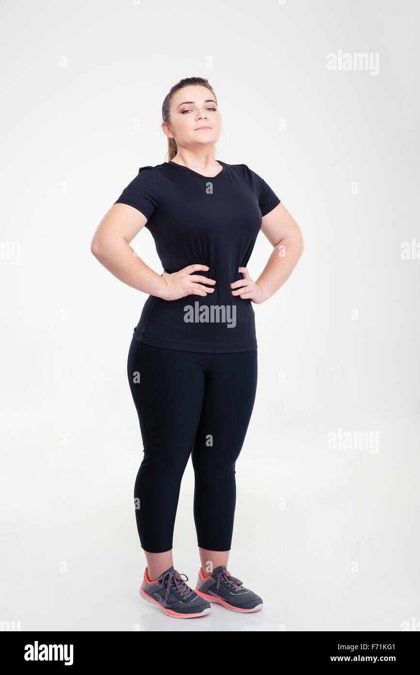 Portrait d'une grosse femme en vêtements sports article isolé sur fond  blanc Photo Stock - Alamy