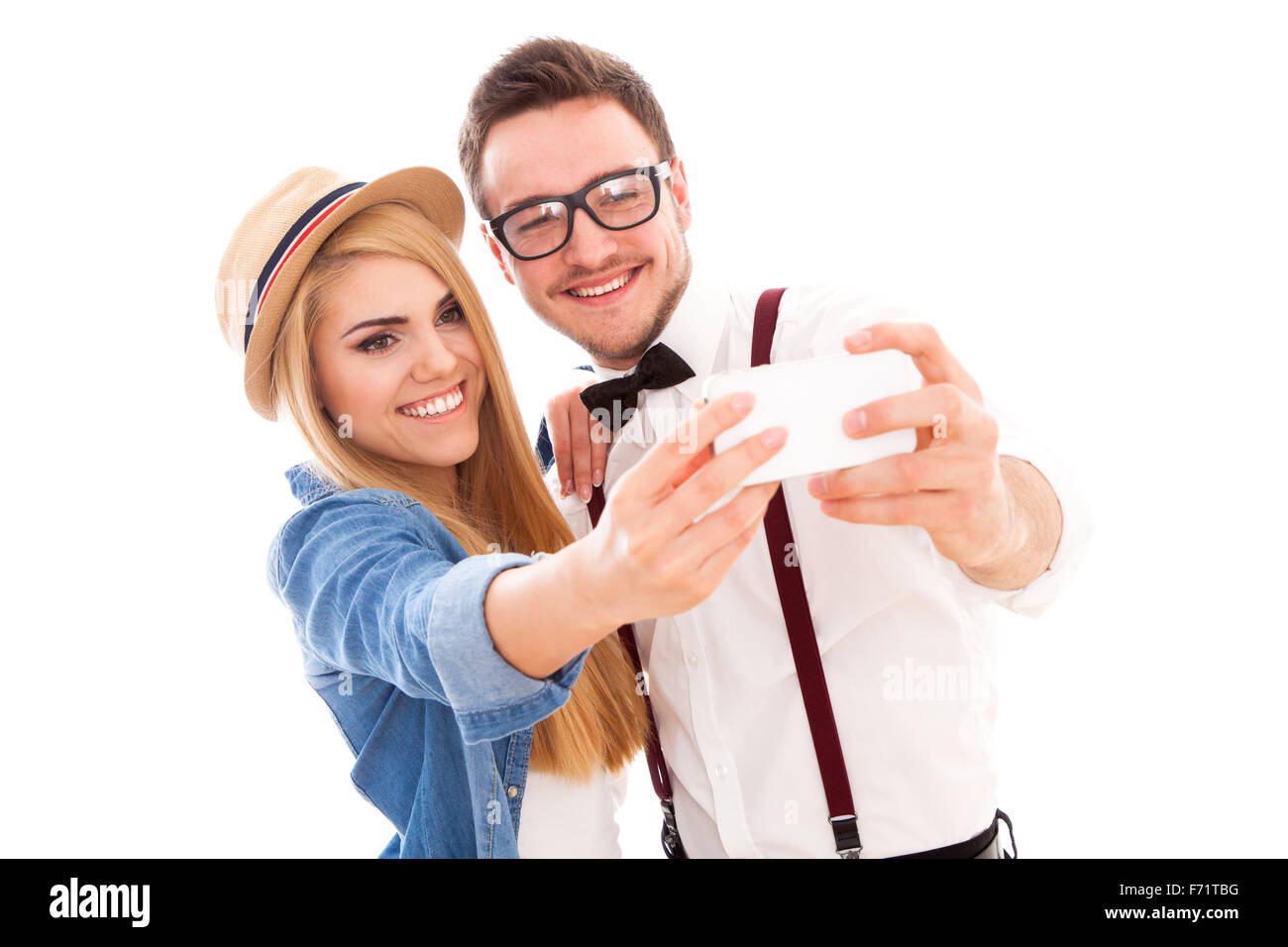 Jeune couple hipster faisant un selfies Banque D'Images