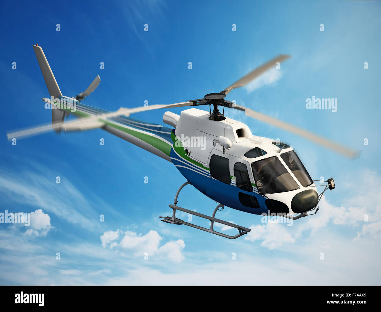 Hélicoptère volant à travers le ciel Banque D'Images
