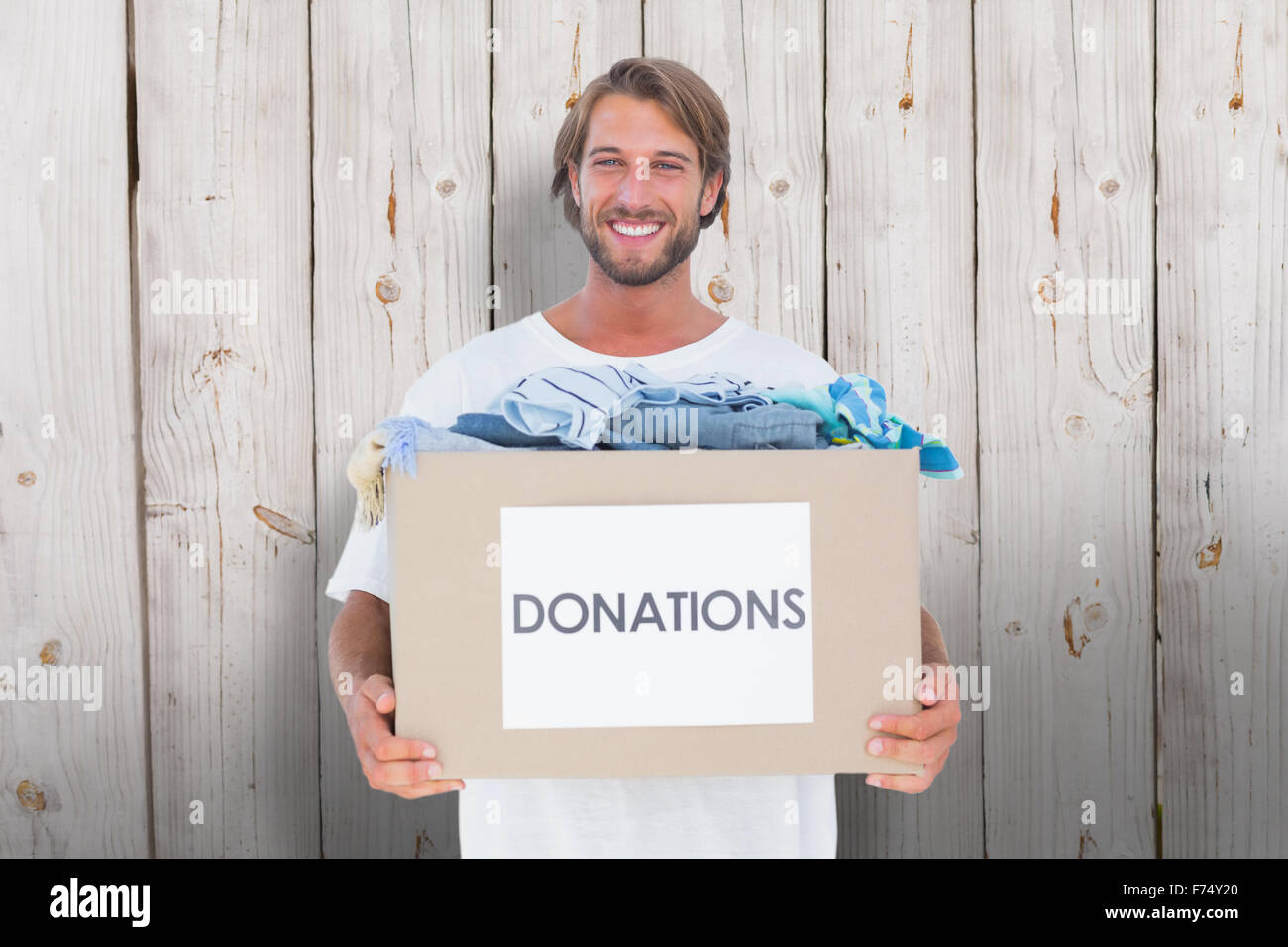 Libre de droits homme portant donation box Banque D'Images