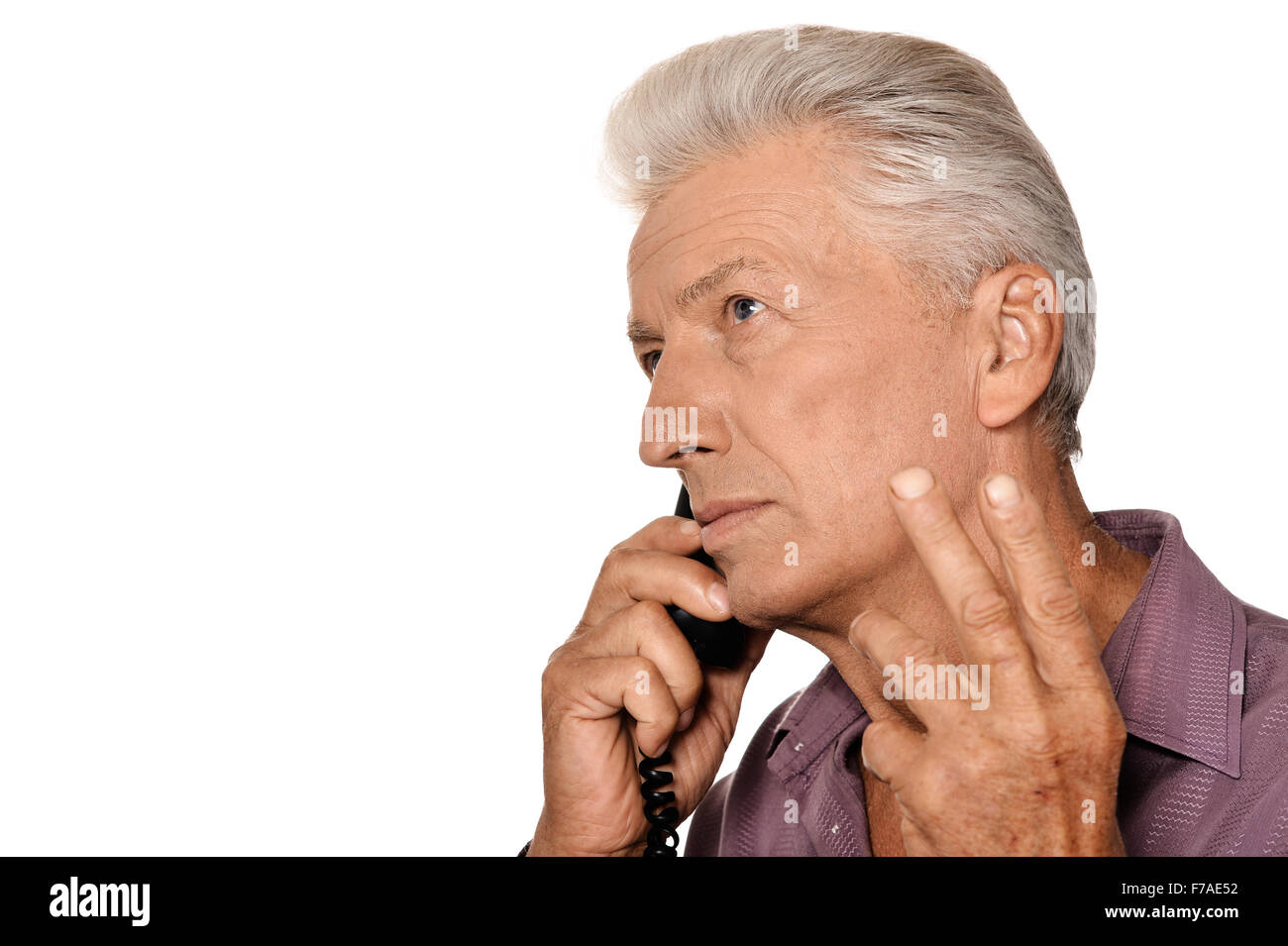 Un homme parle senior Banque D'Images
