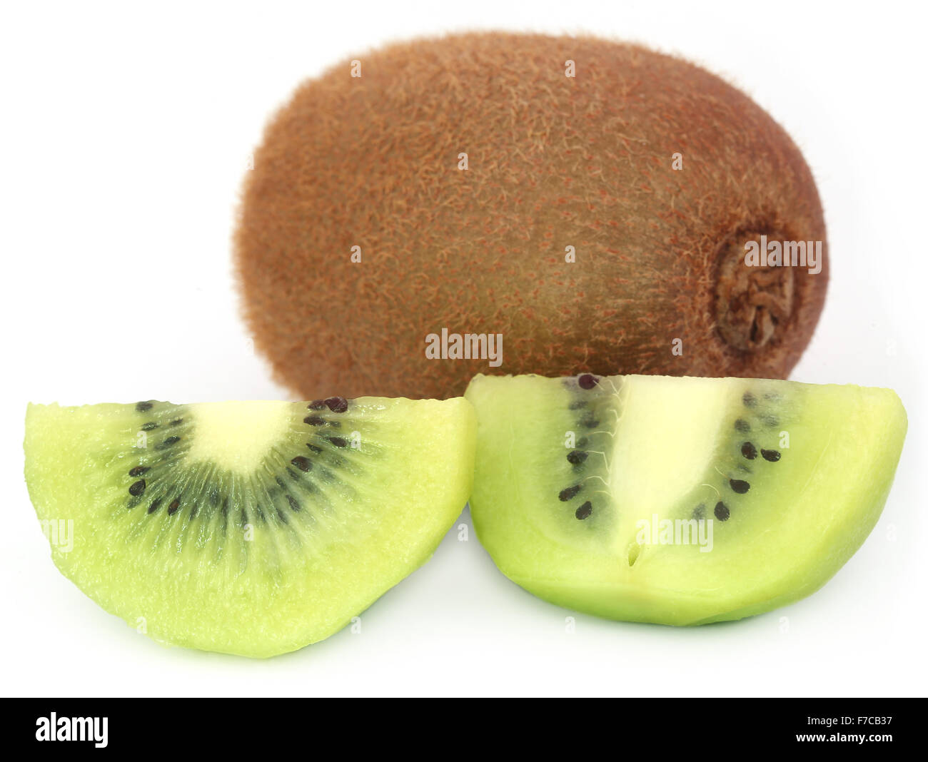 Les kiwis sur fond blanc Banque D'Images