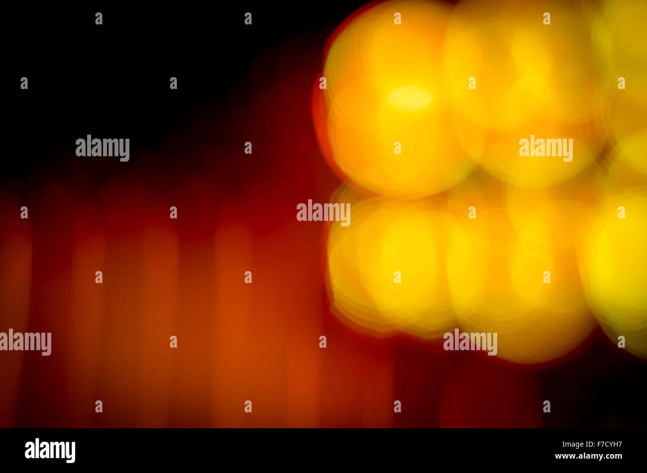 Résumé fond de floue lumières colorées jaune et orange Banque D'Images