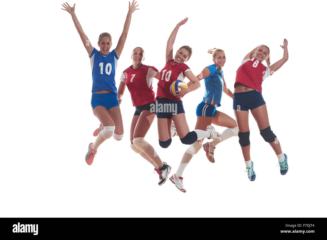 Jeu de volley-ball sport avec groupe de jeunes belles filles dans le sport indoor arena net ball Banque D'Images