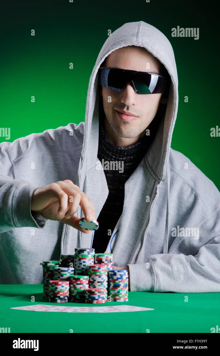 Joueur en casino et jetons Banque D'Images